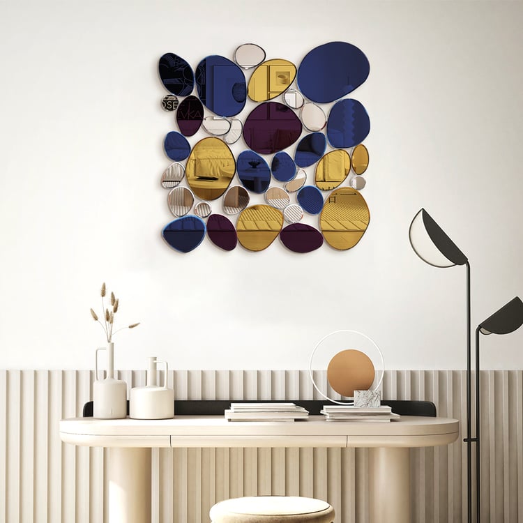 Espejo de pared abstracto con guijarros irregulares y coloridos 